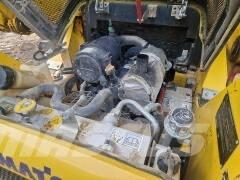 Komatsu SK 820-5 Smykem řízené nakladače