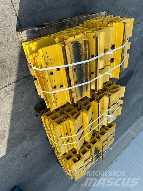 Komatsu d 85 plate Pásy, řetězy a podvozek