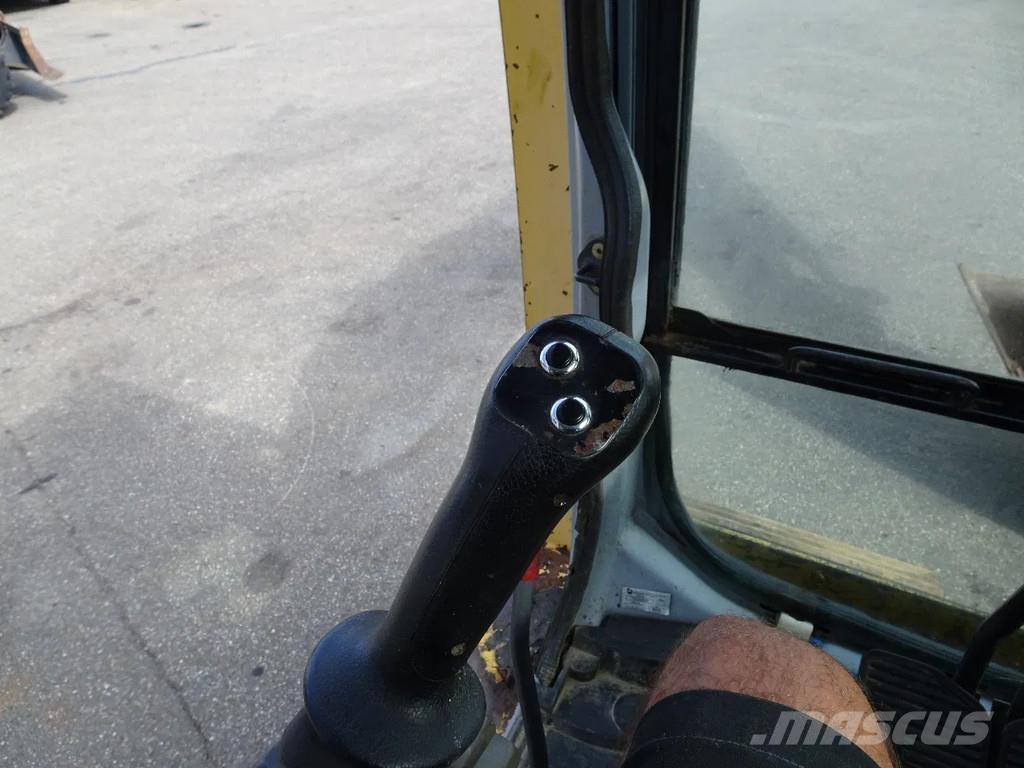 New Holland E195 Pásová rýpadla