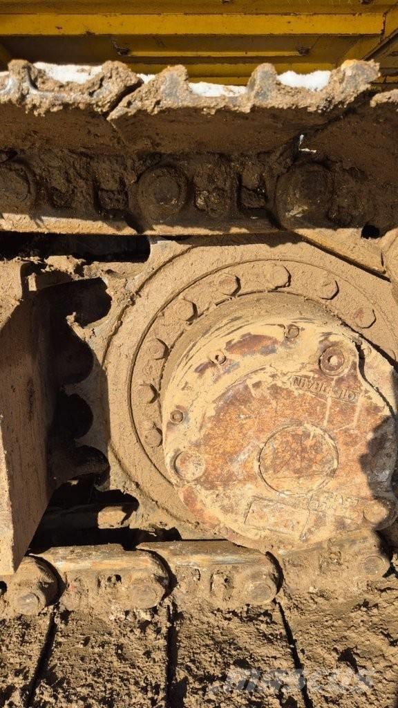 New Holland E 175 B Pásová rýpadla