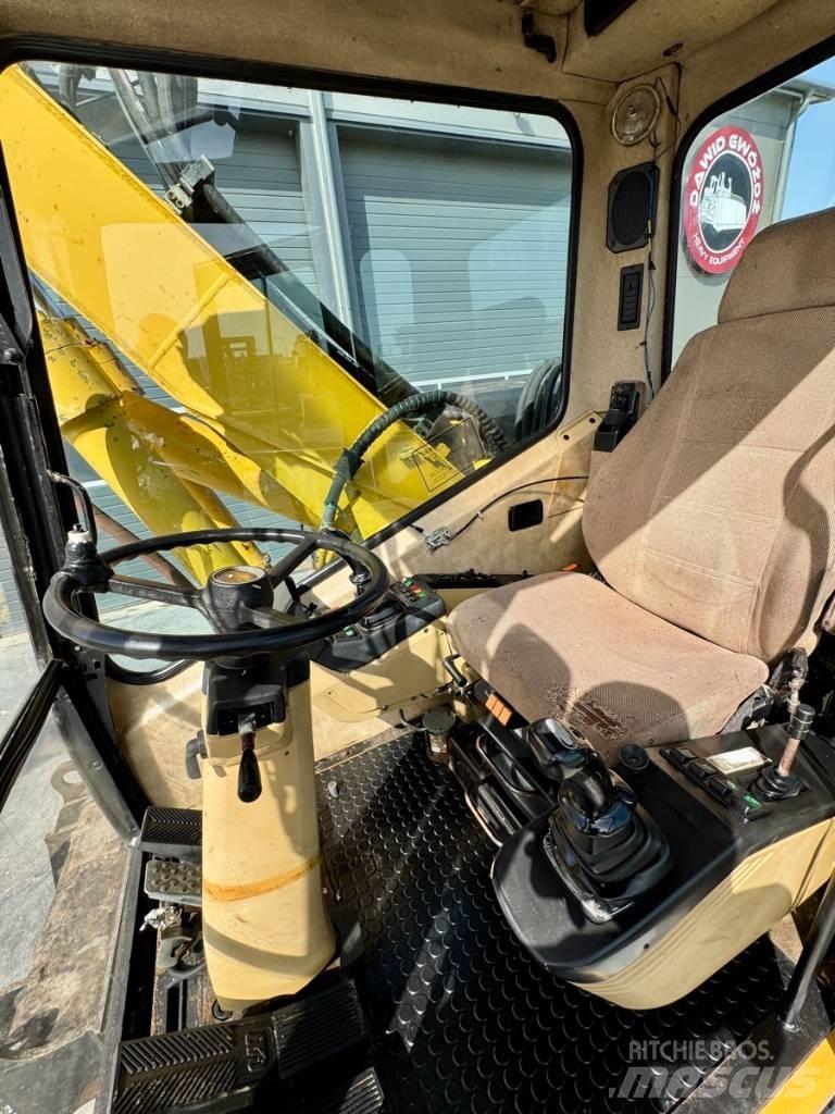 CAT M 312 Kolová rýpadla