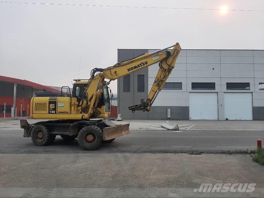 Komatsu PW 140-7 Kolová rýpadla