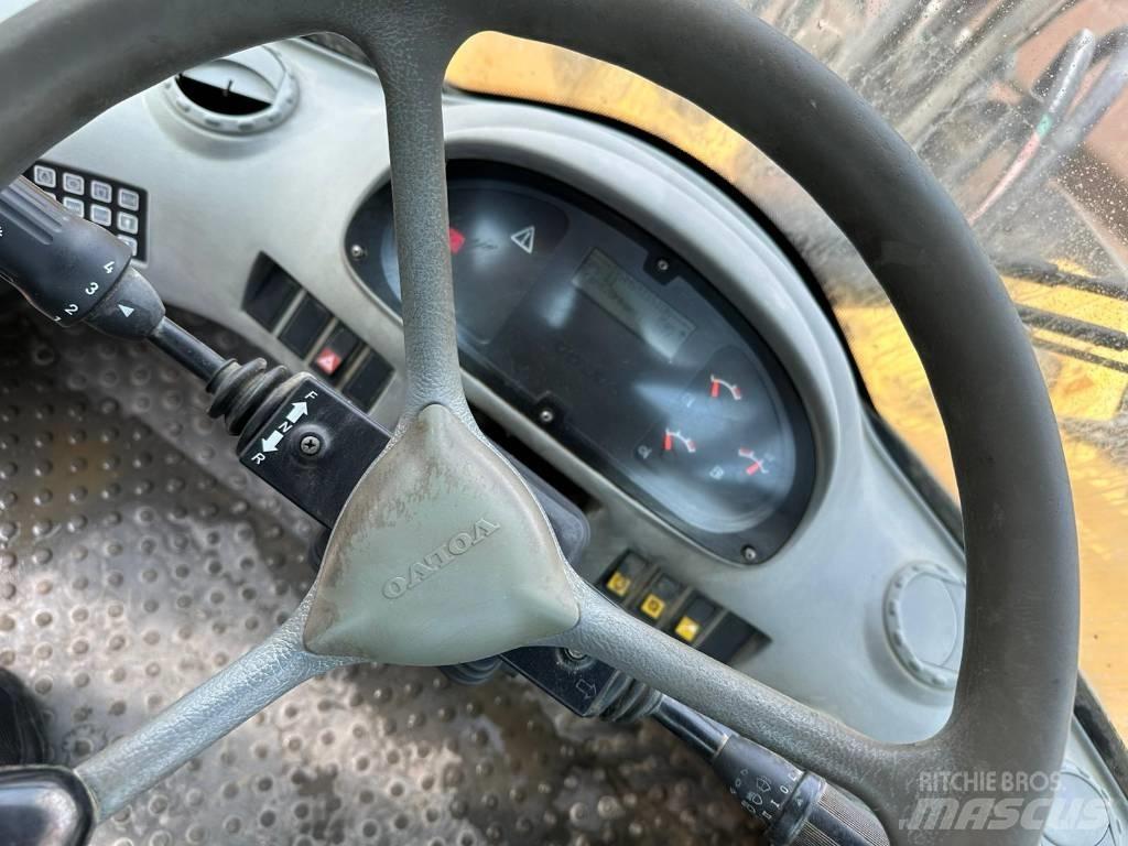 Volvo L180E Kolové nakladače