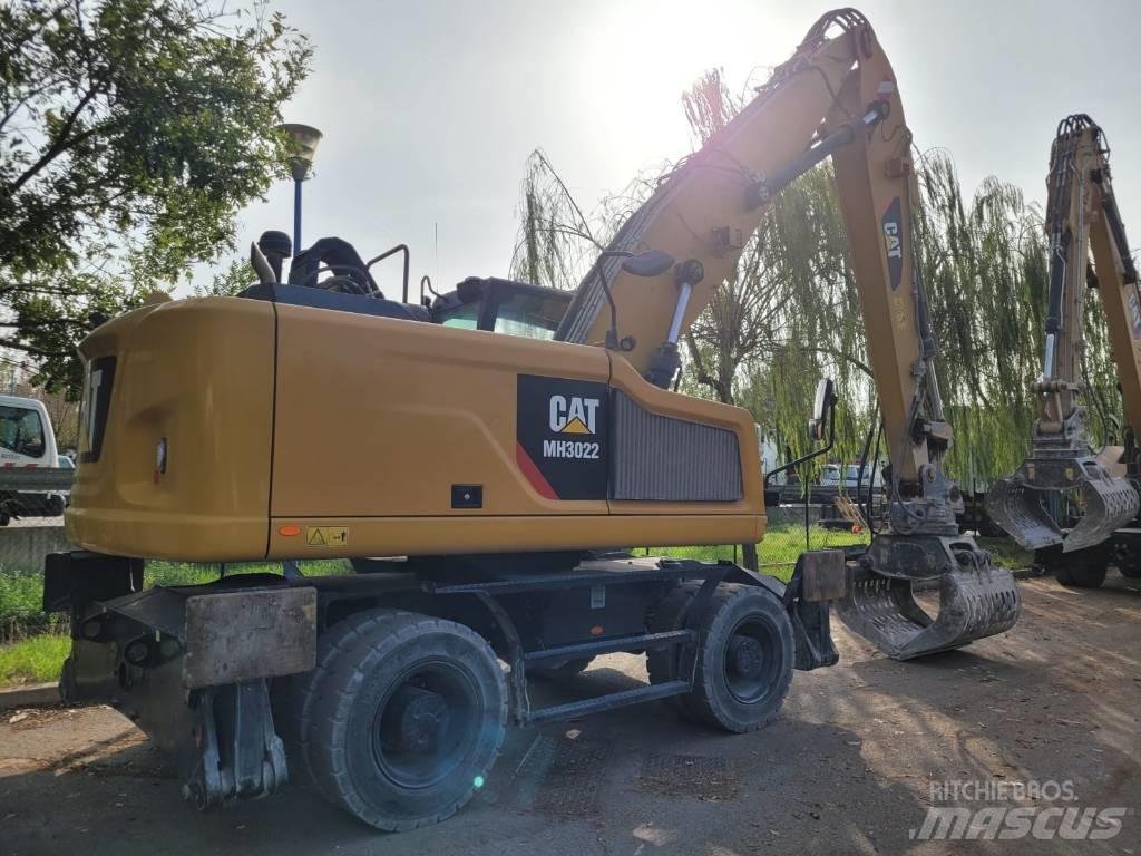 CAT mh3022 Kolová rýpadla