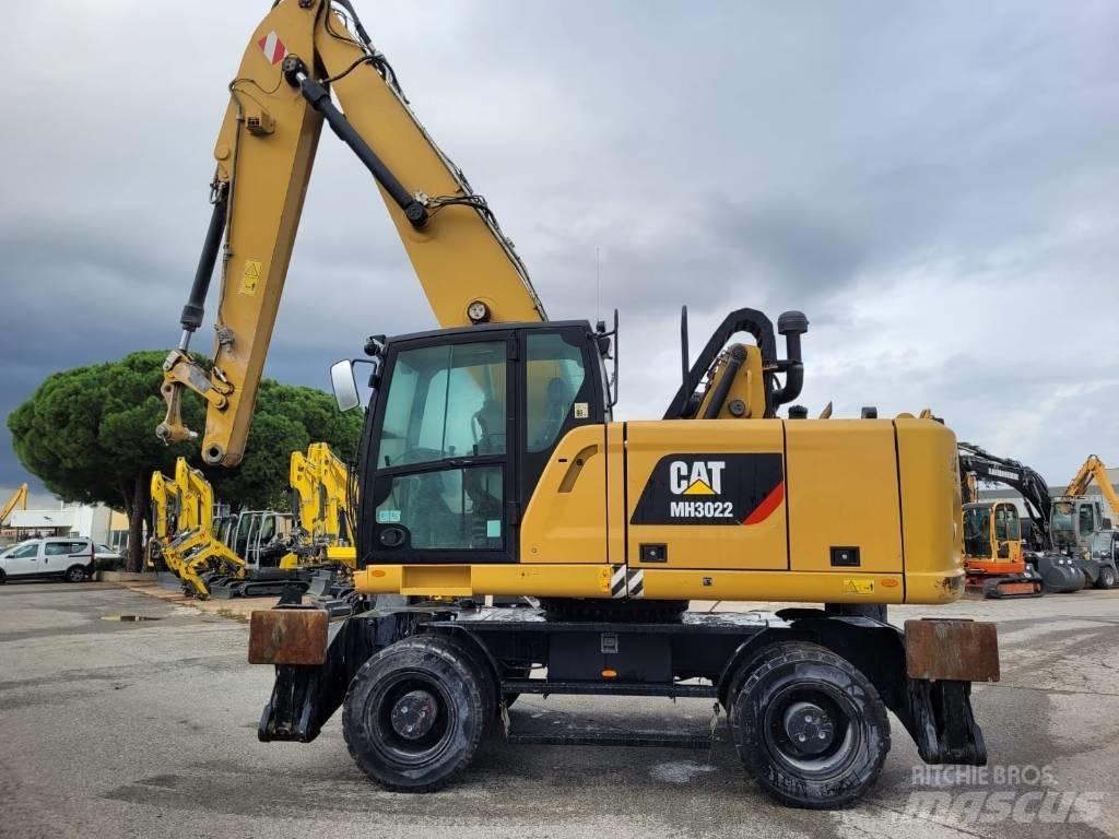 CAT mh3022 Kolová rýpadla