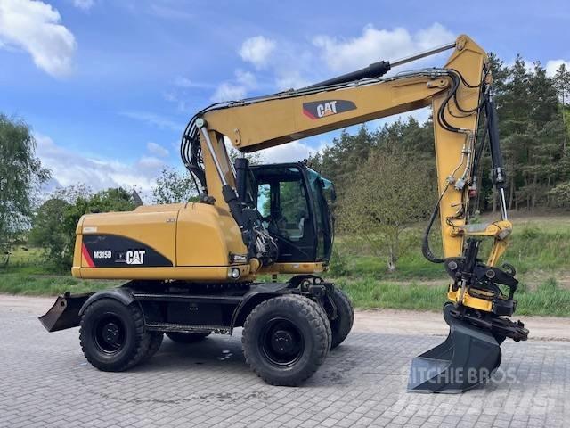 CAT M 315 D Kolová rýpadla