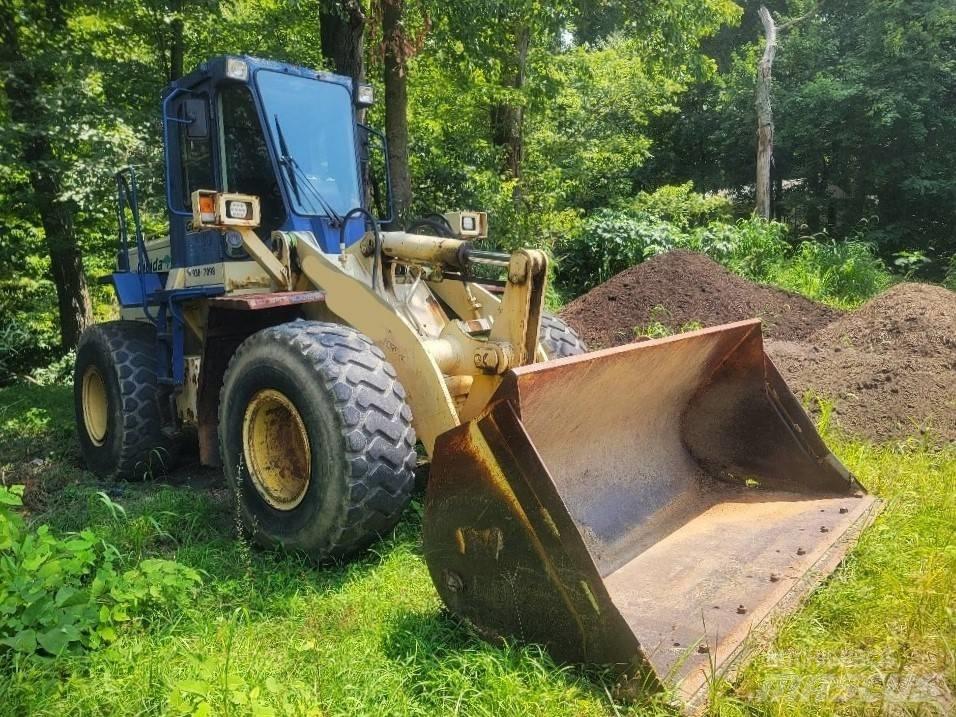 Komatsu WA 250 Kolové nakladače
