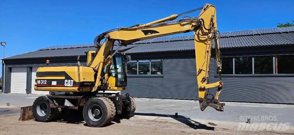 CAT M312 Kolová rýpadla