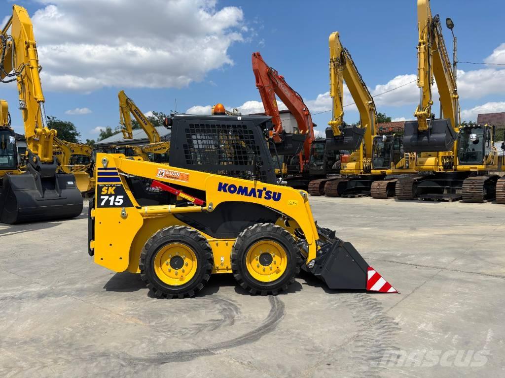 Komatsu SK 715-8 Smykem řízené nakladače