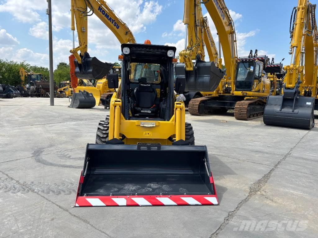 Komatsu SK 715-8 Smykem řízené nakladače
