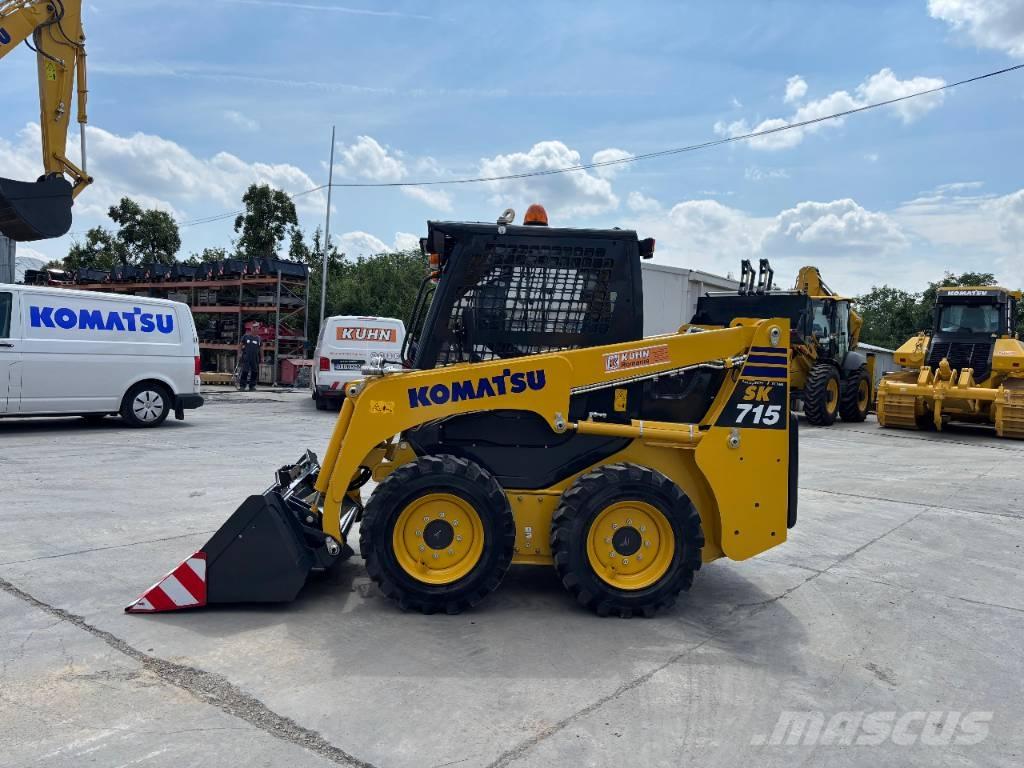 Komatsu SK 715-8 Smykem řízené nakladače