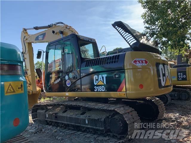 CAT 318DL Pásová rýpadla