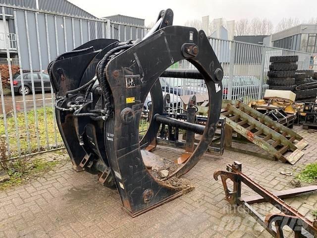 CAT 950M Klešťové drapáky