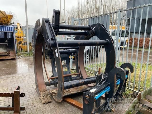 CAT 950M Klešťové drapáky