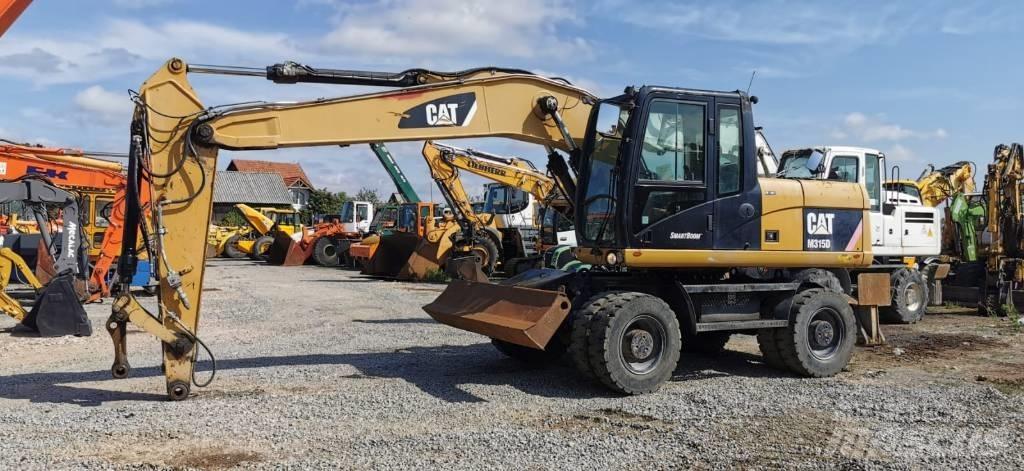 CAT M 315 D Kolová rýpadla