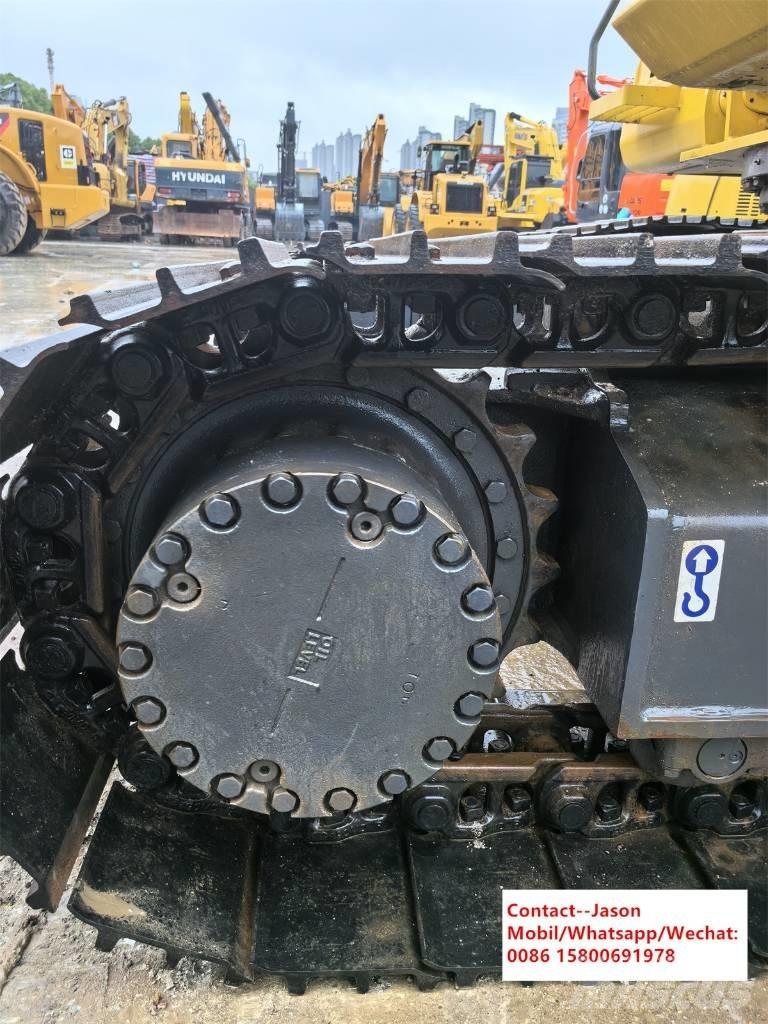 Komatsu PC210 Pásová rýpadla