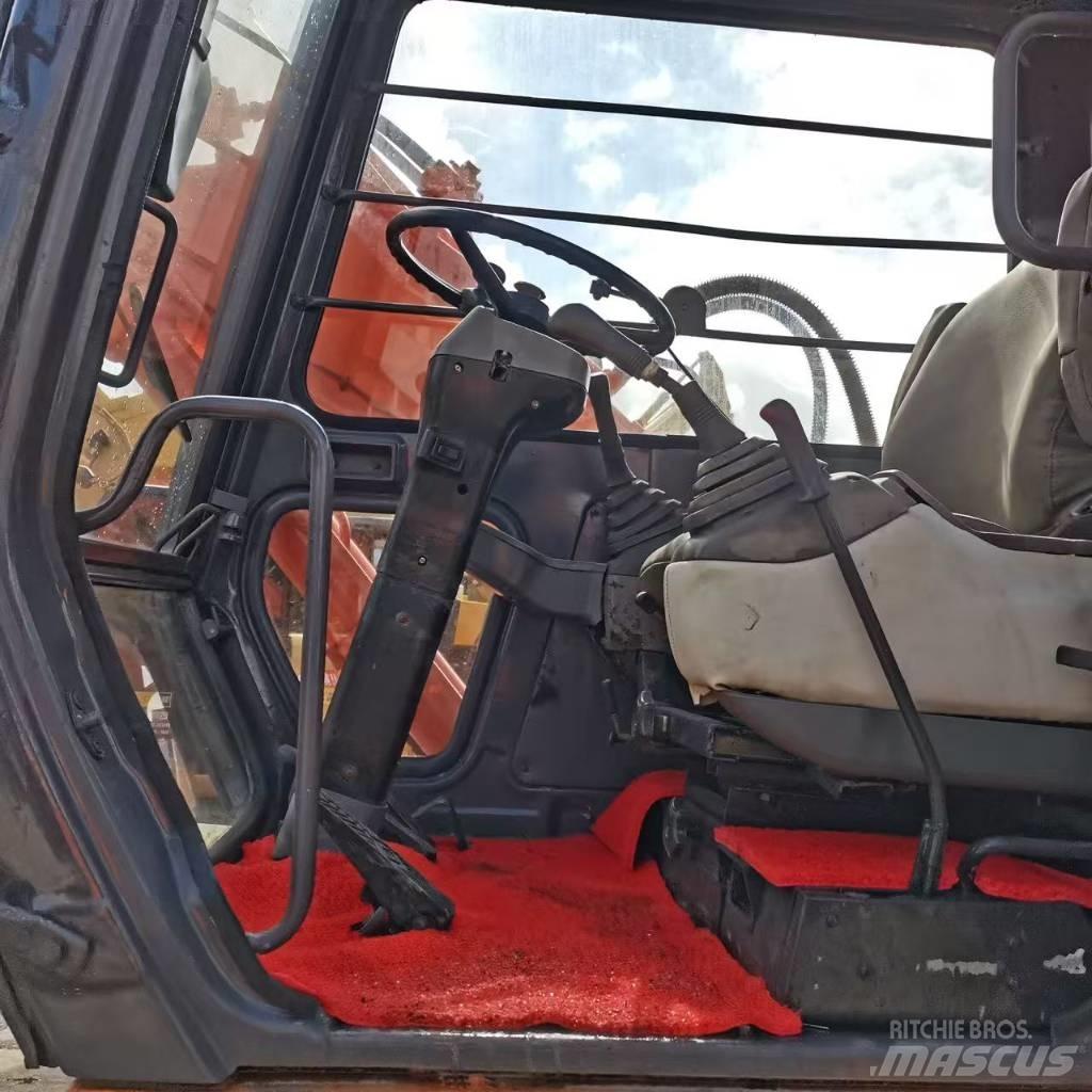 Hitachi EX 100 W D Kolová rýpadla
