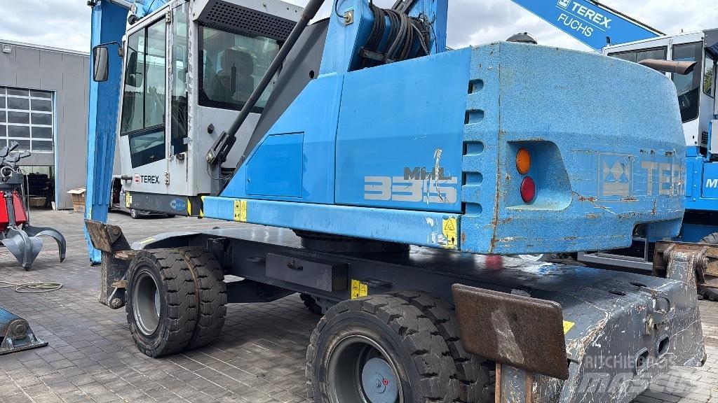 Fuchs MHL 335 E Stroje pro manipulaci s odpadem