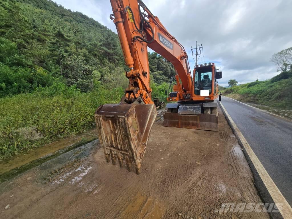 Doosan DX 210 W Kolová rýpadla