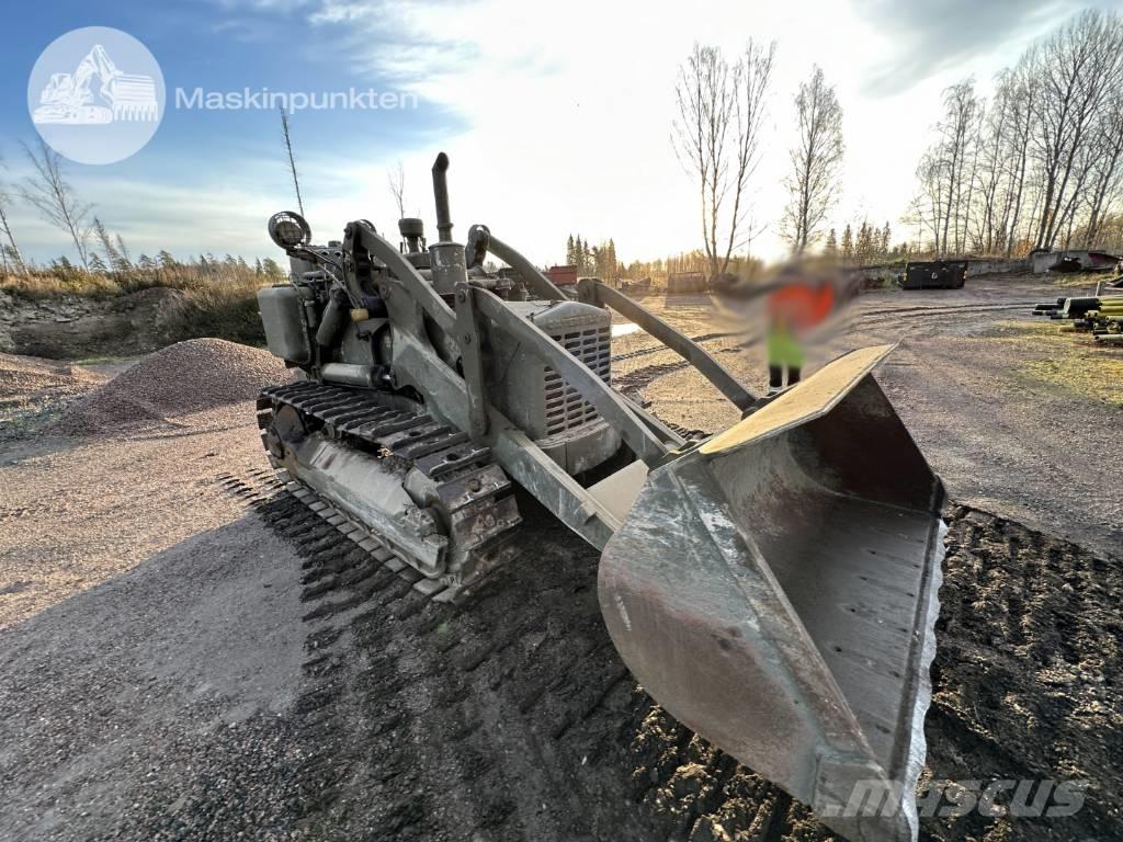 CAT 955 Pásové nakladače