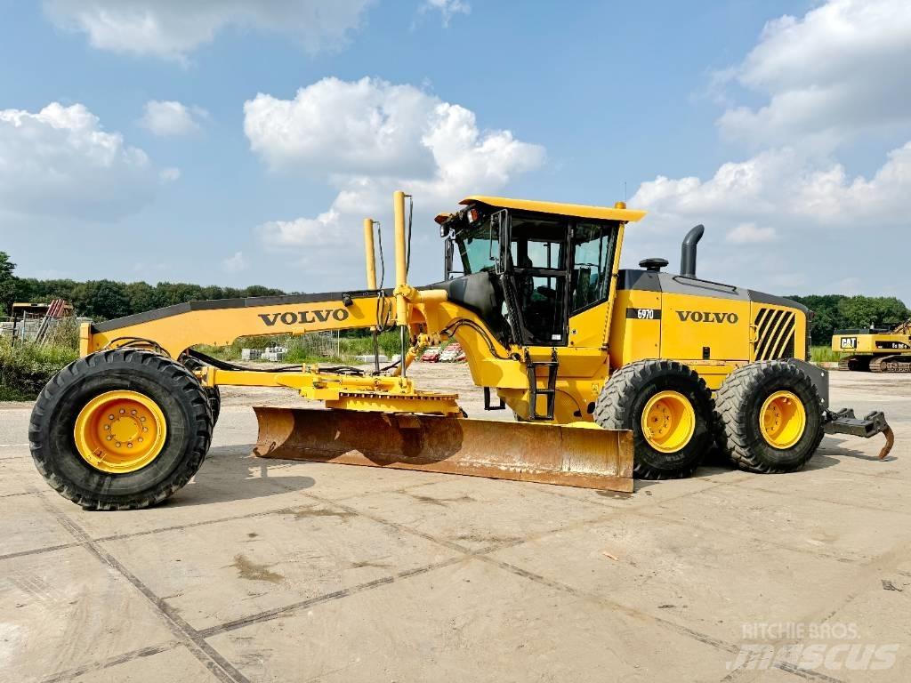 Volvo G970 + RIPPER Grejdry