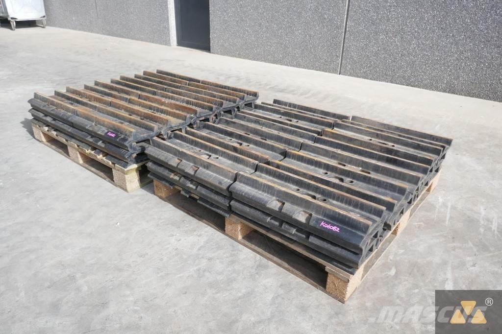 CAT 330 Trackshoes Pneumatiky, kola a ráfky