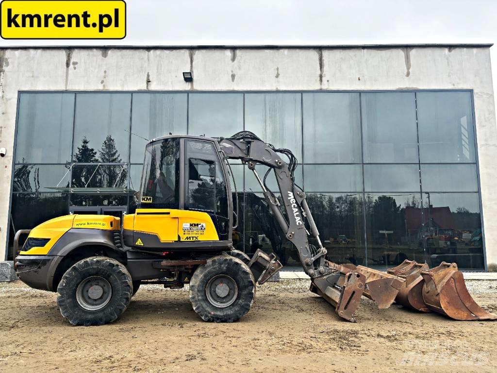 Mecalac 12 MTX Rýpadlo-nakladače