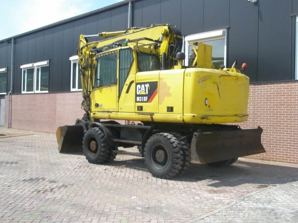 CAT M318F Kolová rýpadla