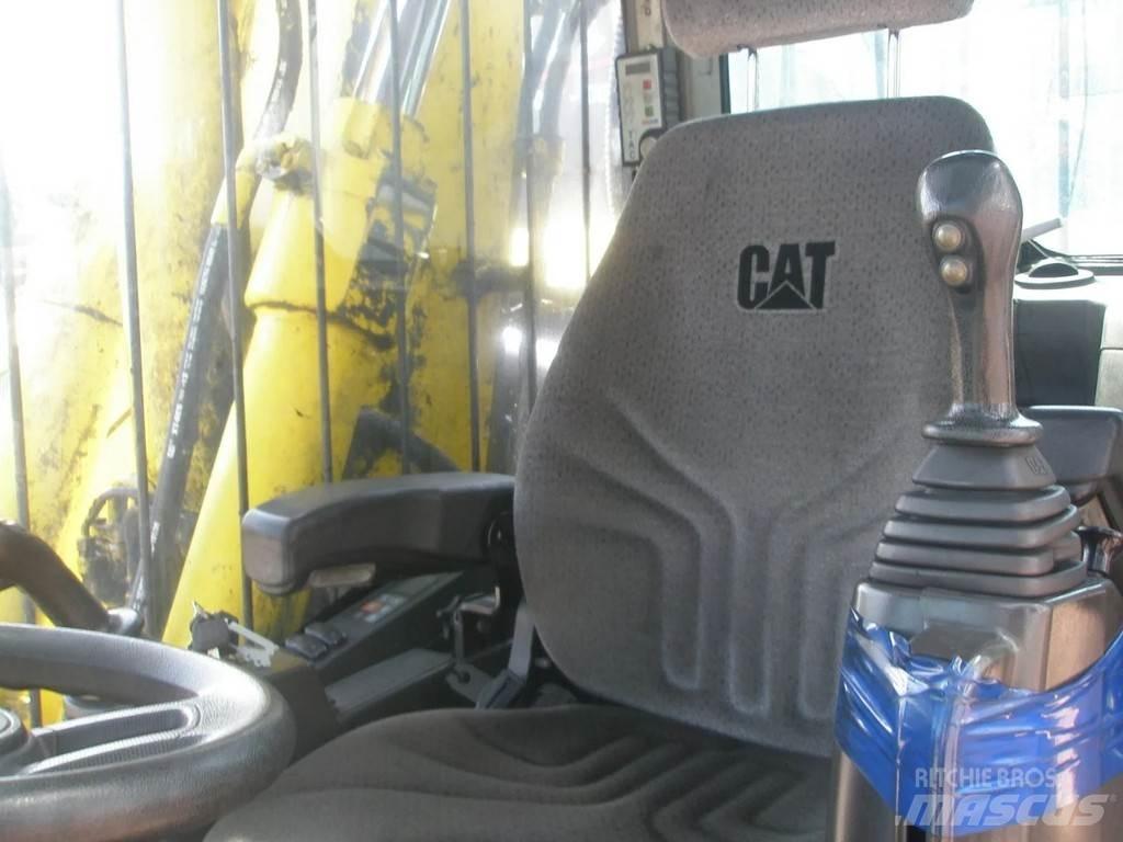 CAT M318F Kolová rýpadla