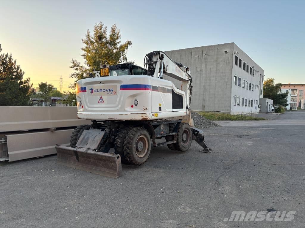 CAT m314f Kolová rýpadla
