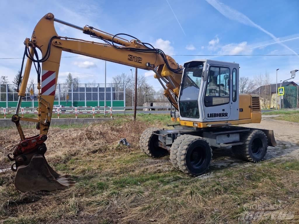 Liebherr 312 A Kolová rýpadla