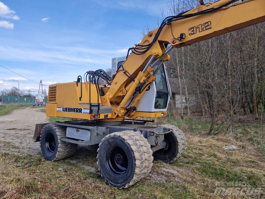 Liebherr 312 A Kolová rýpadla