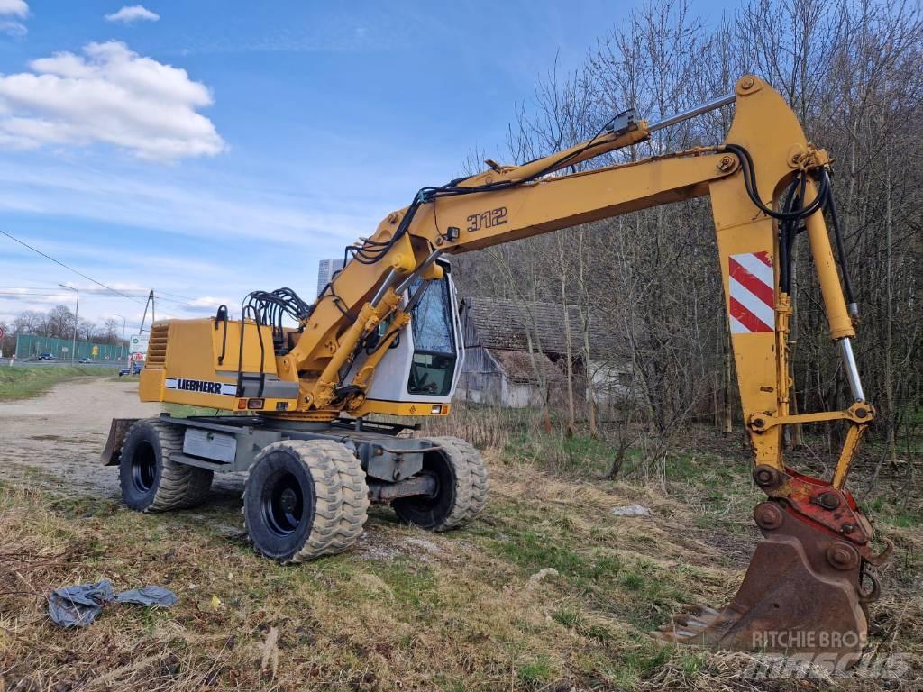 Liebherr 312 A Kolová rýpadla