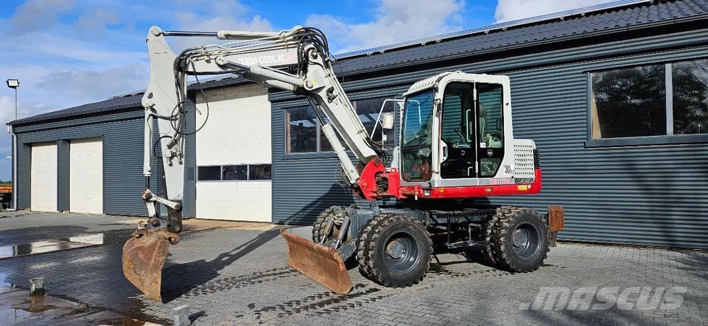 Takeuchi TB 175W Midi rýpadla 7t - 12t