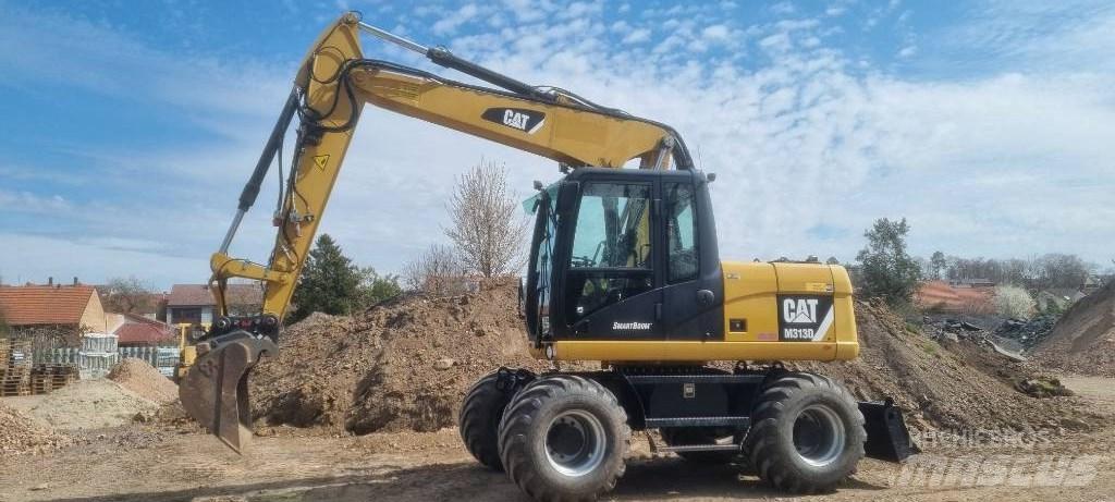CAT M 313 D Kolová rýpadla