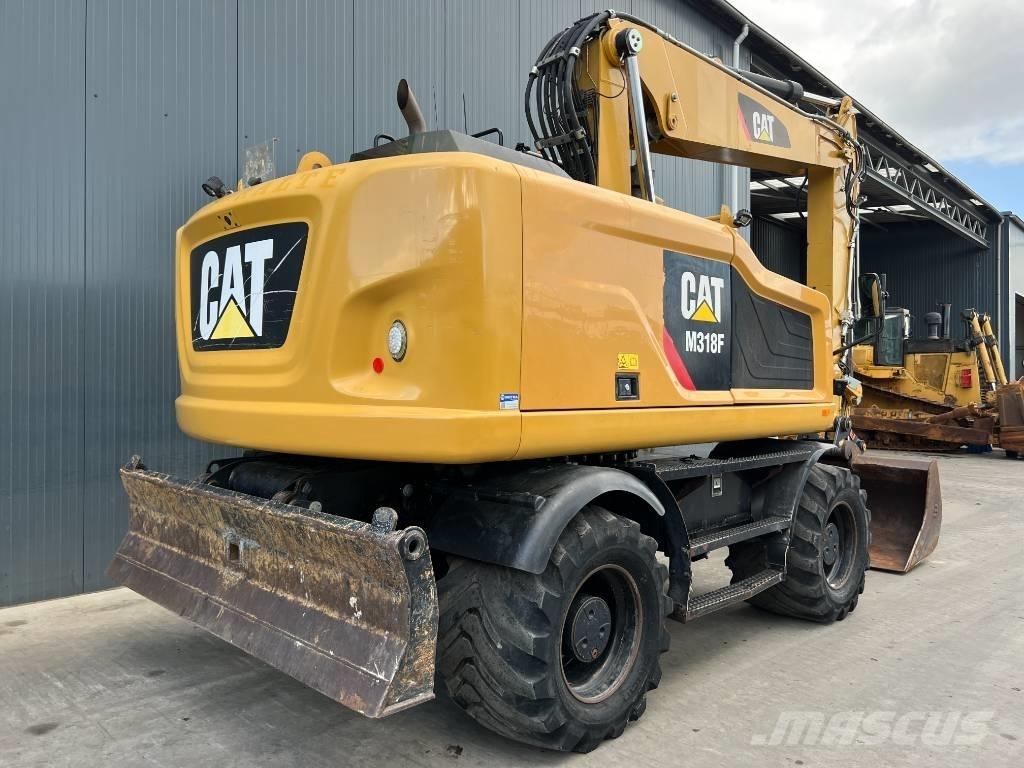 CAT M318F Kolová rýpadla