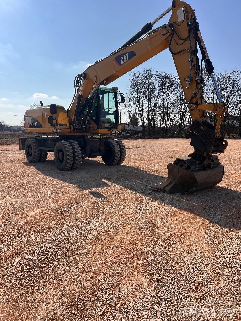 CAT 316D Kolová rýpadla