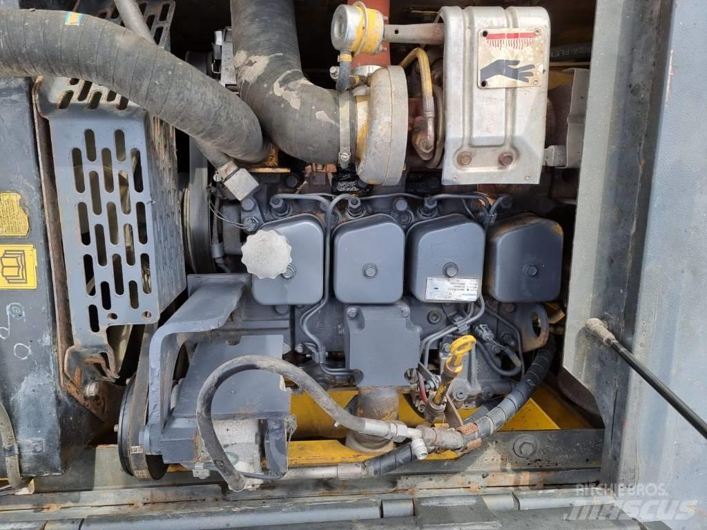 Komatsu PW 130-7K Kolová rýpadla