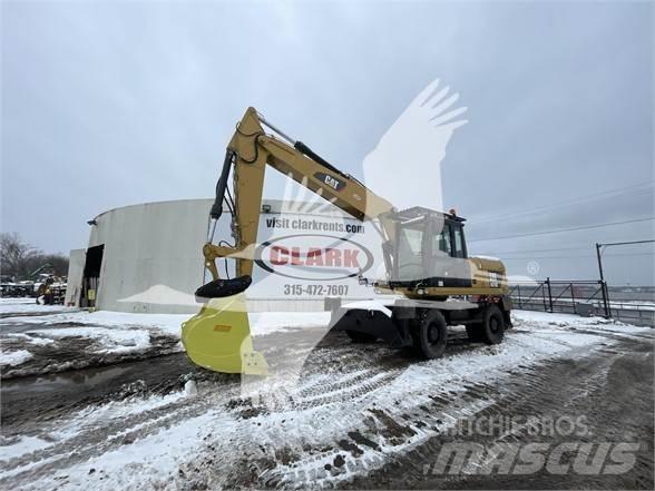 CAT M318D Kolová rýpadla