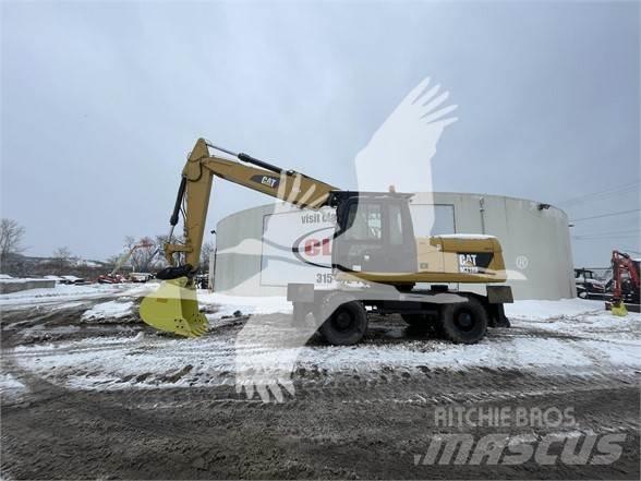 CAT M318D Kolová rýpadla