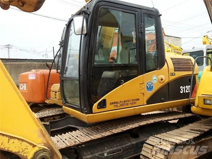 CAT 312 D Pásová rýpadla