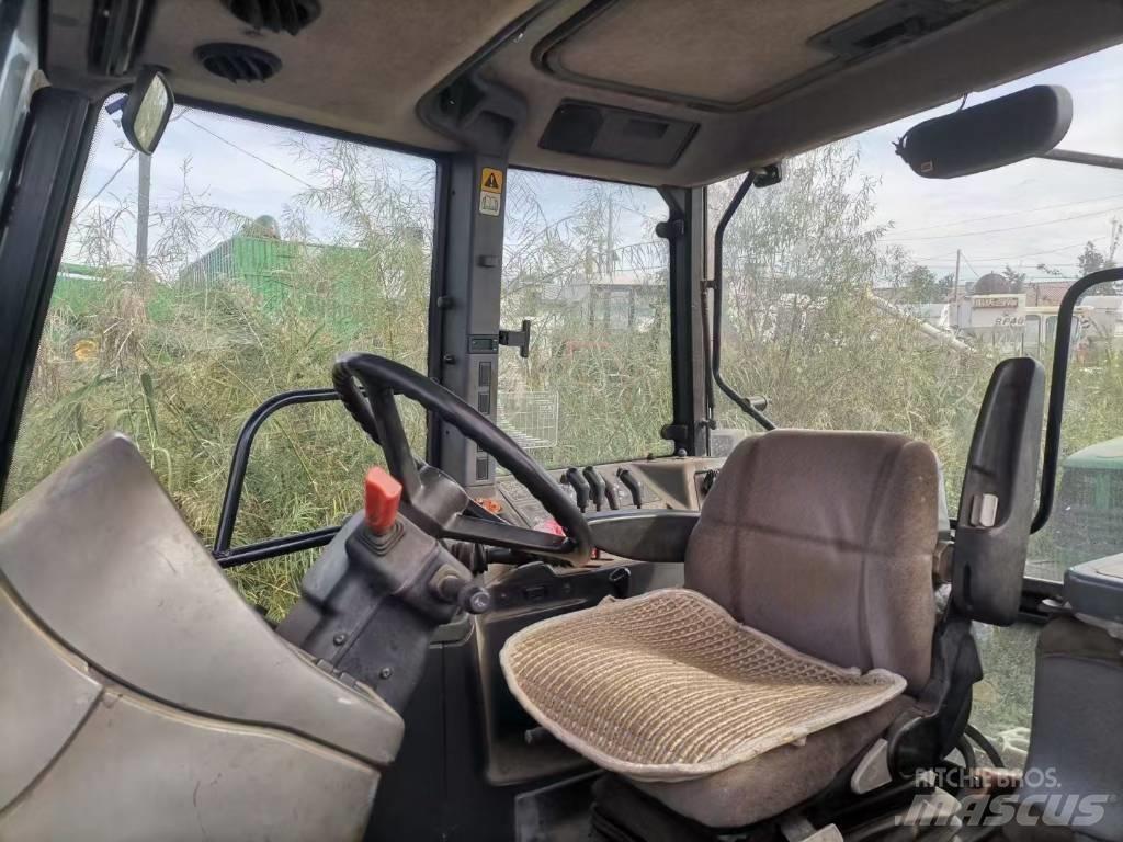 New Holland M160 Traktory