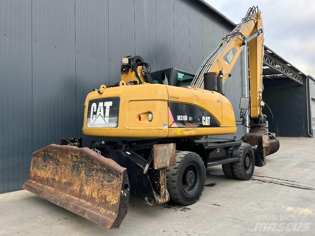 CAT M318D MH Stroje pro manipulaci s odpadem