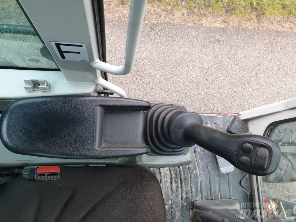 Takeuchi TB 295 W Kolová rýpadla