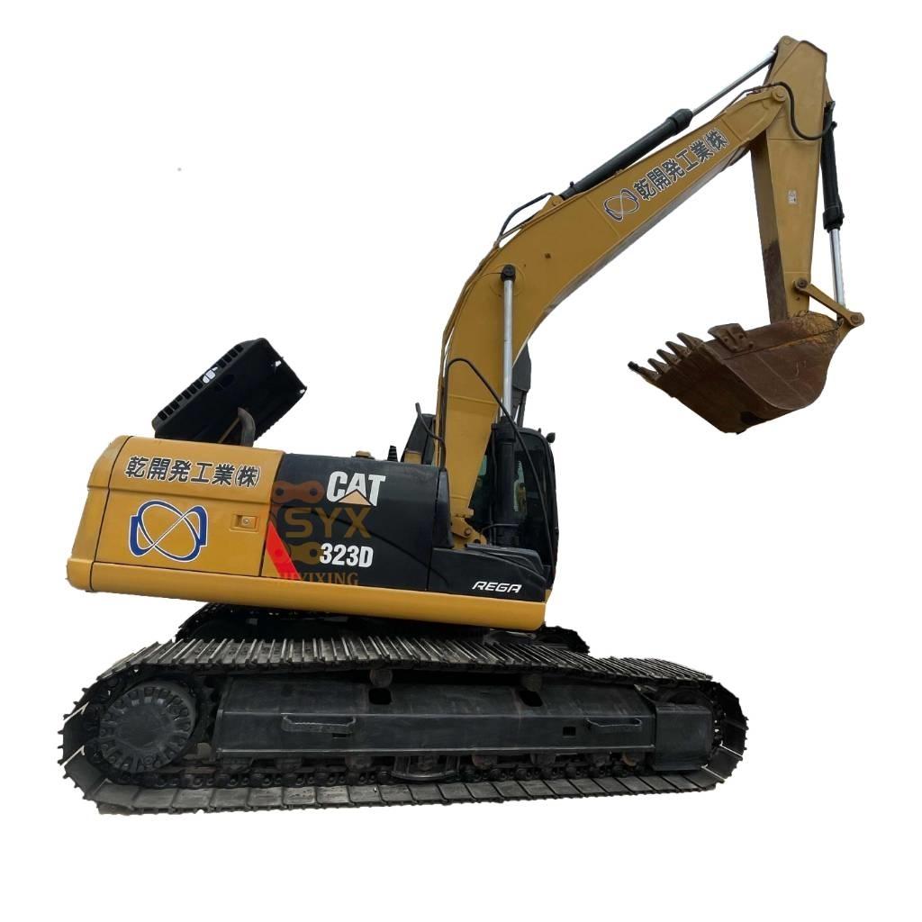 CAT 323D Pásová rýpadla