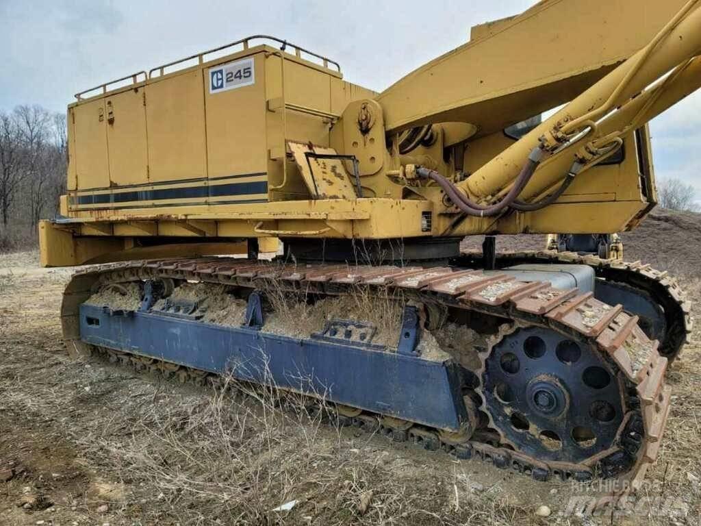 CAT 245 Pásová rýpadla