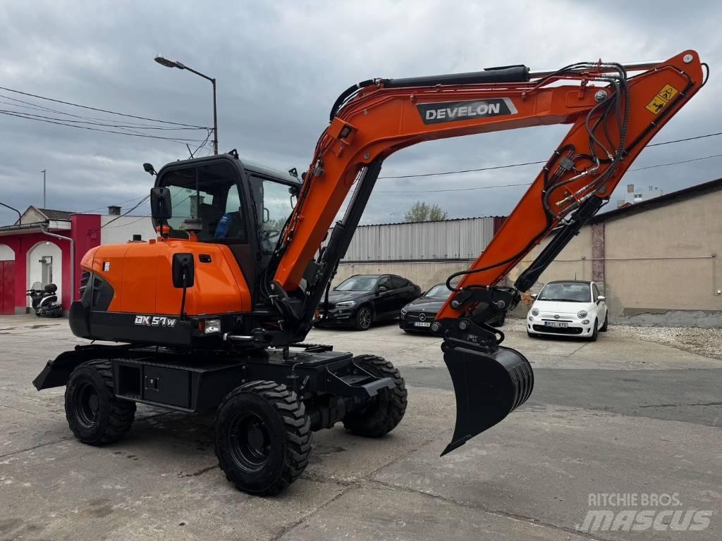 Develon DX 57 W-7 Kolová rýpadla