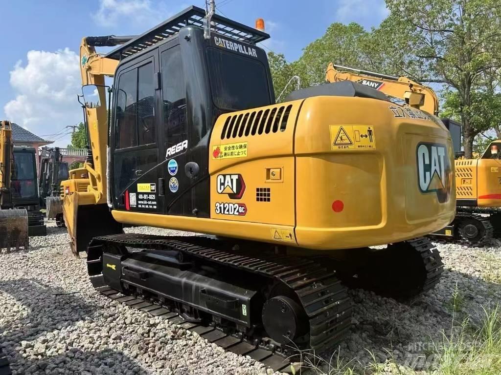 CAT 312 DGC Pásová rýpadla