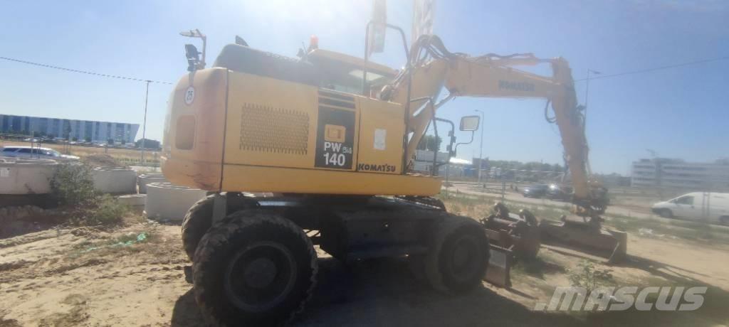 Komatsu PW 140-7 Kolová rýpadla