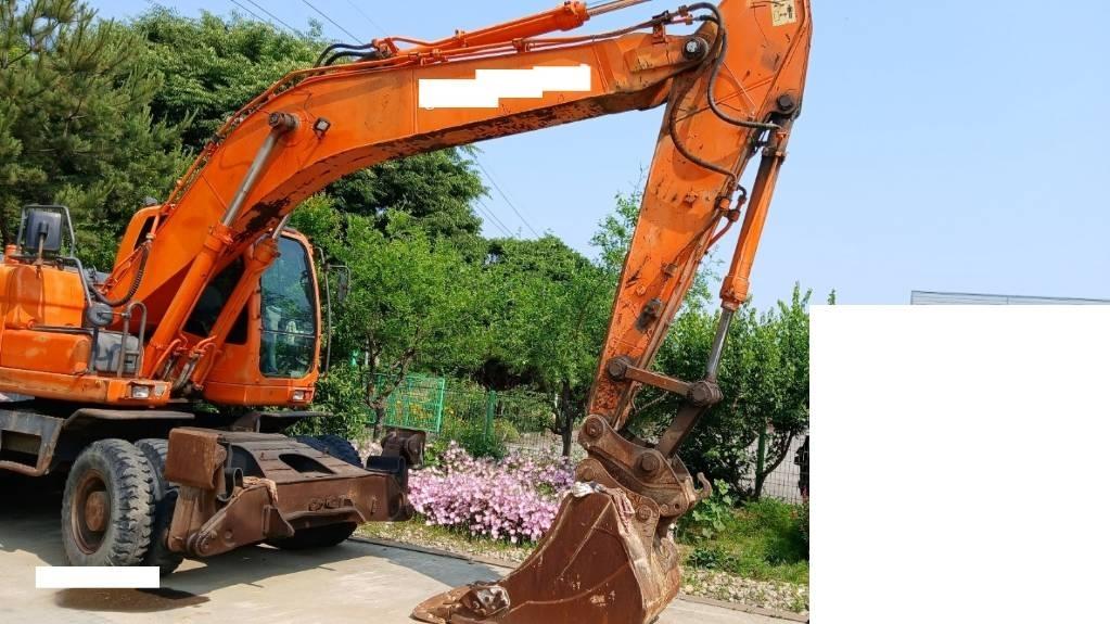 Doosan DX 210 W Kolová rýpadla